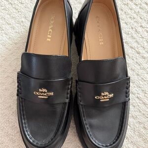 COACH Women’s Black Leather Penny Loafer Platforms